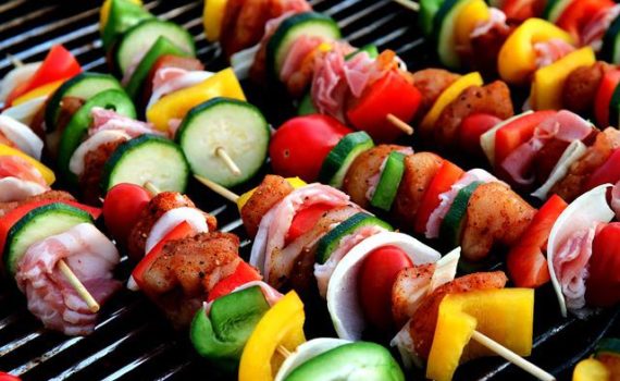 meat and veggies shish-kebab on grill